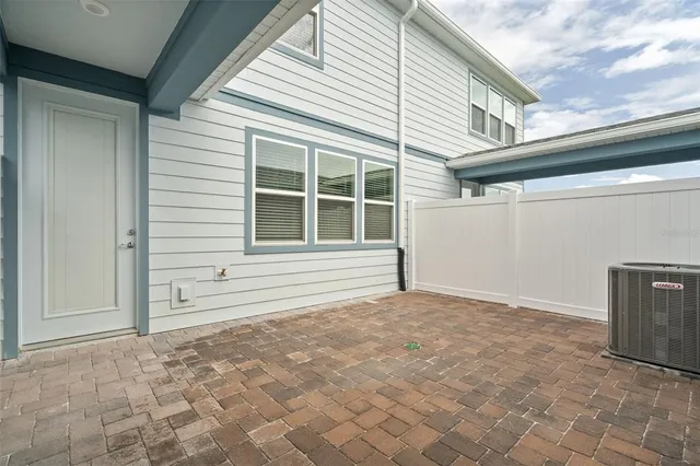 a view of empty room with windows