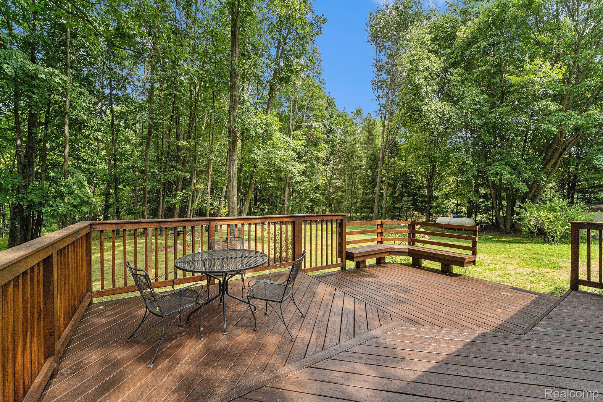 1725 Parker Road Holly, MI 48442 - Photo 22 of 24 Freshly stained deck to enjoy your peaceful views