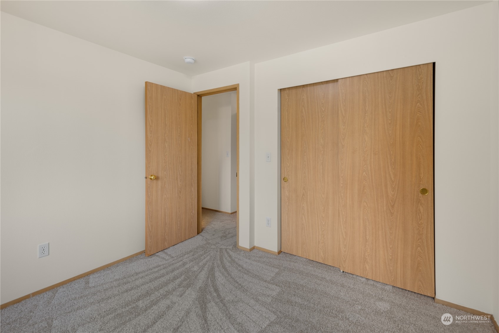 2313 211th Street Southeast Bothell, WA 98021 - Photo 17 of 25 a view of an empty room with wooden floor