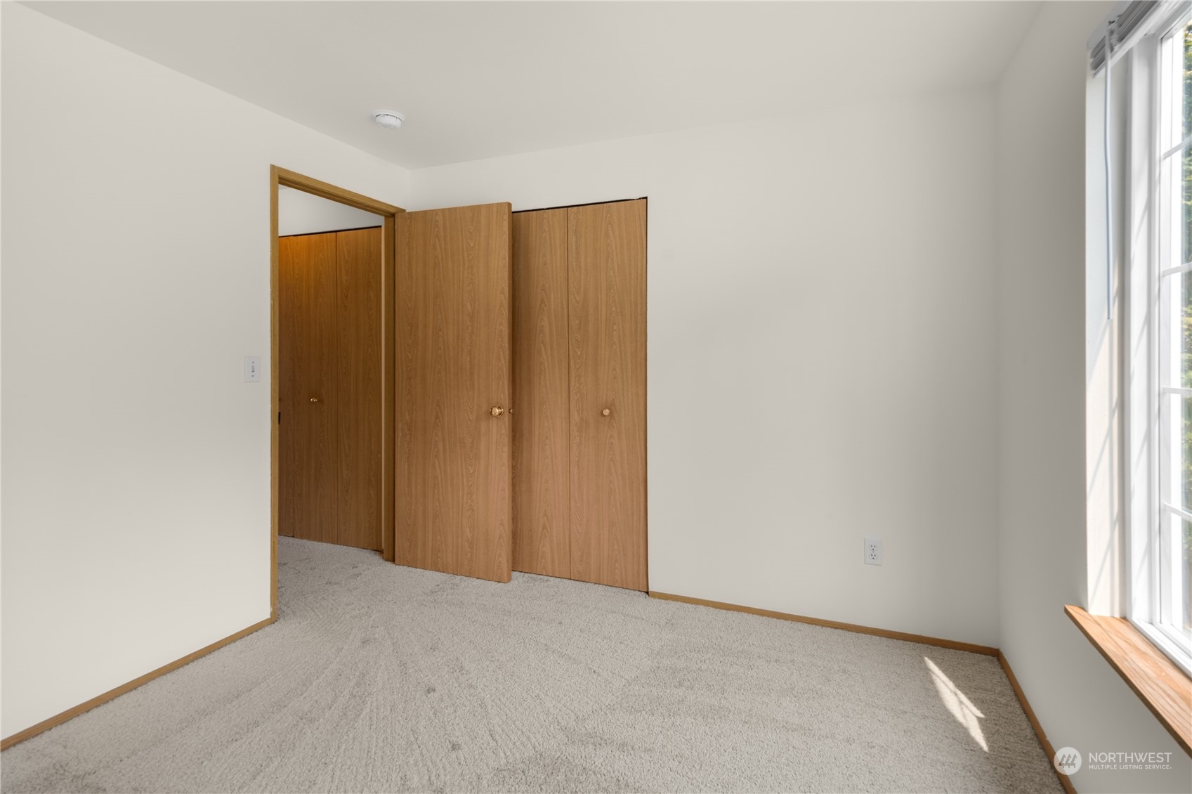 2313 211th Street Southeast Bothell, WA 98021 - Photo 20 of 25 a view of an empty room and window