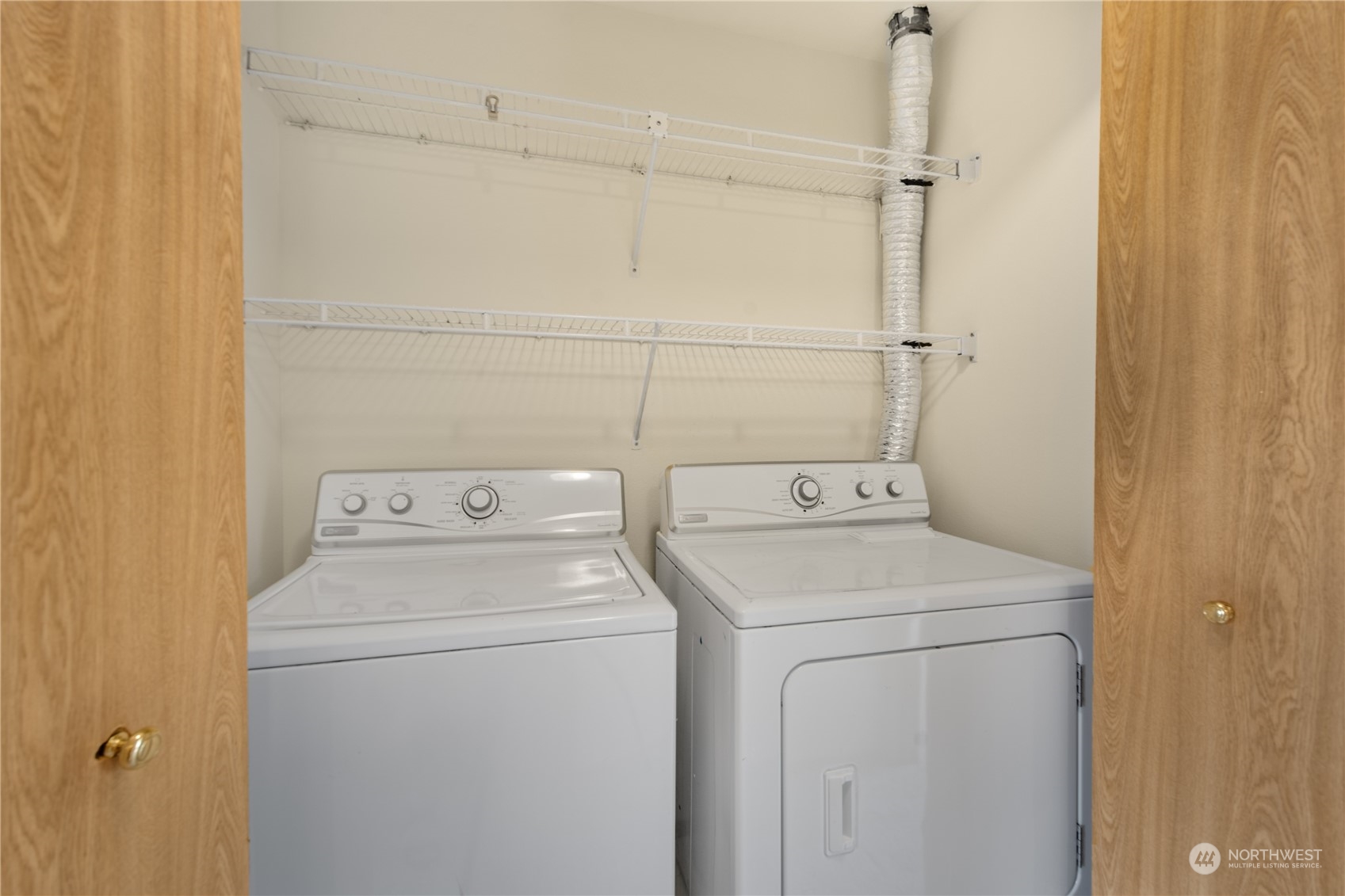 2313 211th Street Southeast Bothell, WA 98021 - Photo 22 of 25 a utility room with dryer and washer