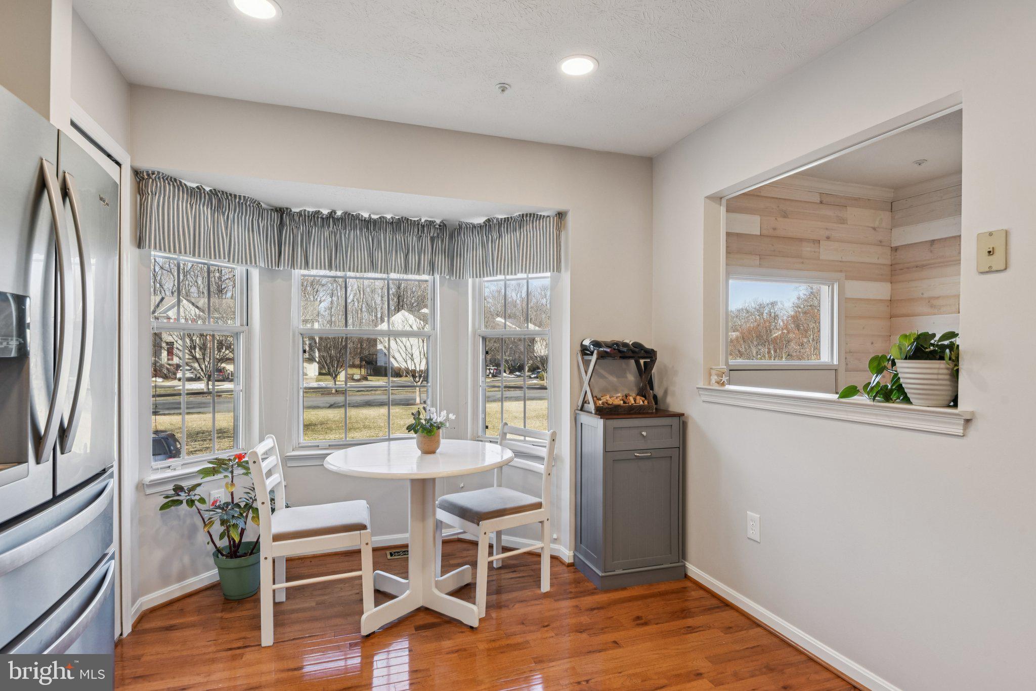2612 Tallwind Court Crofton, MD 21054 - Photo 14 of 38 a dining room with furniture and wooden floor