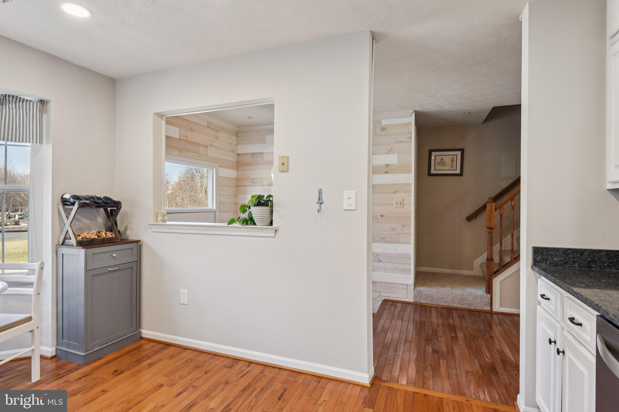 2612 Tallwind Court Crofton, MD 21054 - Photo 15 of 38 a view of kitchen with furniture and wooden floor