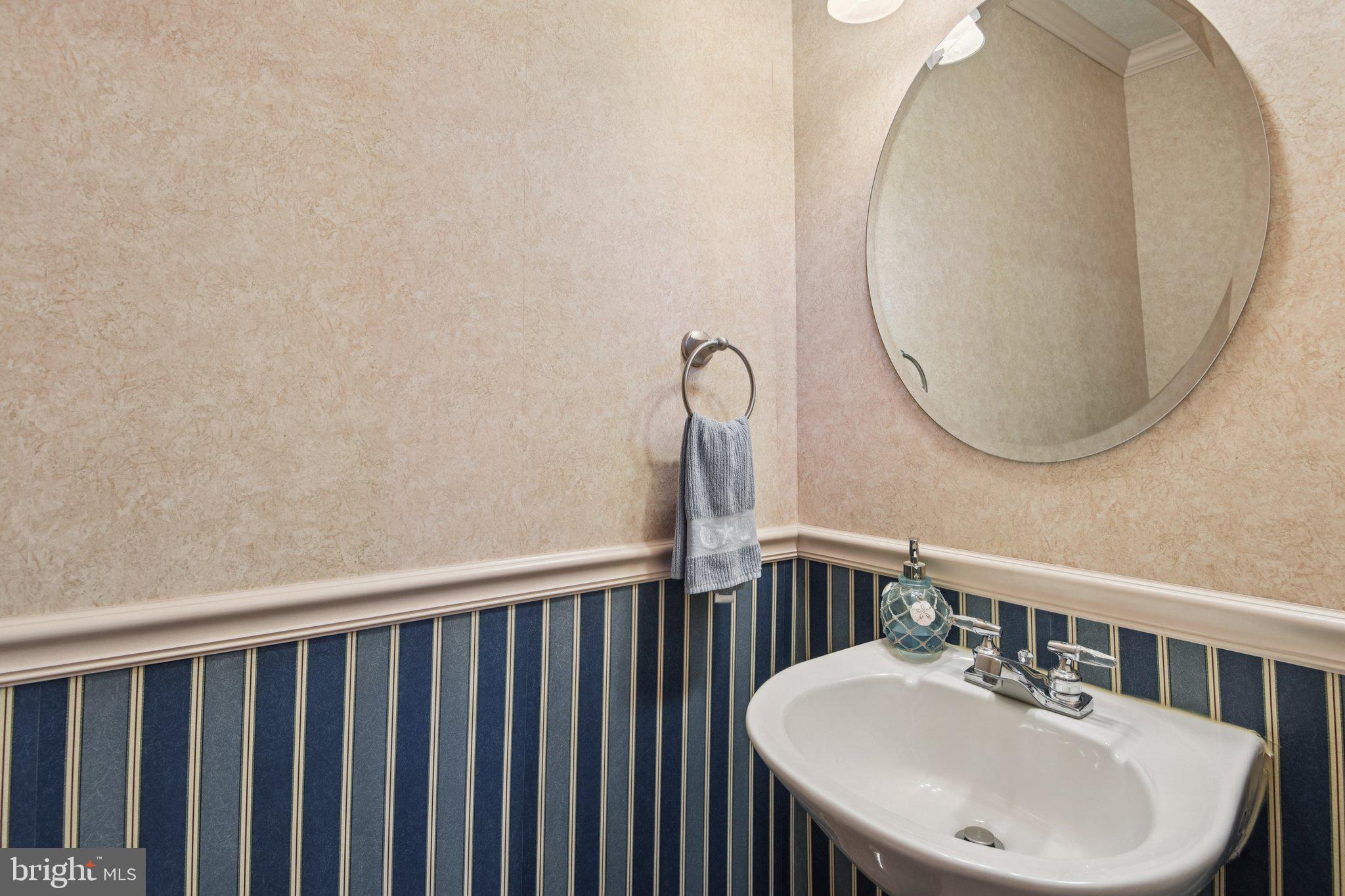 2612 Tallwind Court Crofton, MD 21054 - Photo 16 of 38 a bathroom with a sink and a mirror