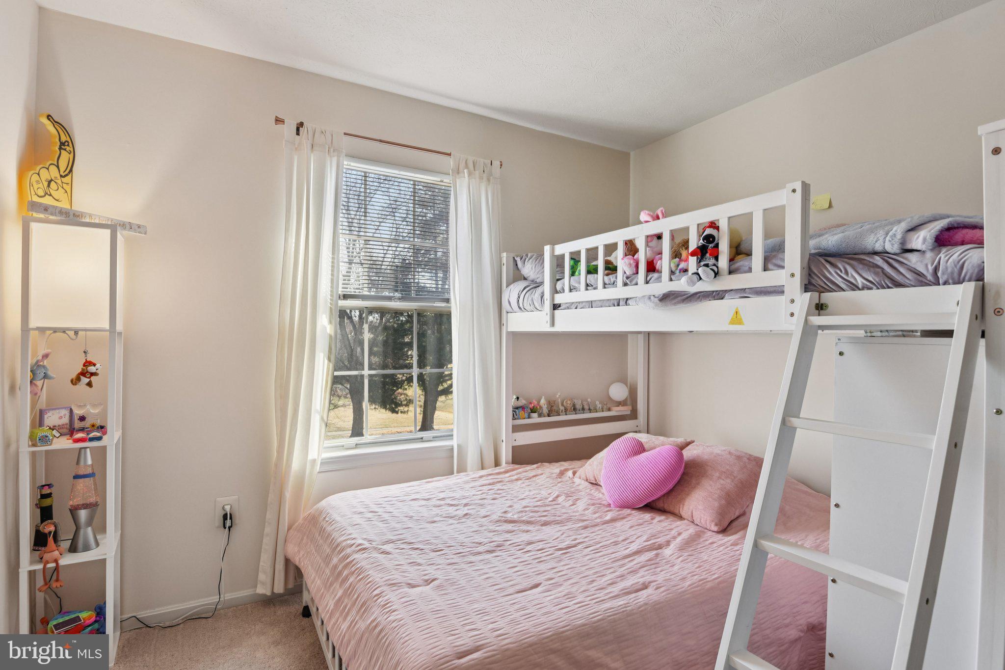 2612 Tallwind Court Crofton, MD 21054 - Photo 17 of 38 a bedroom with a bed and window