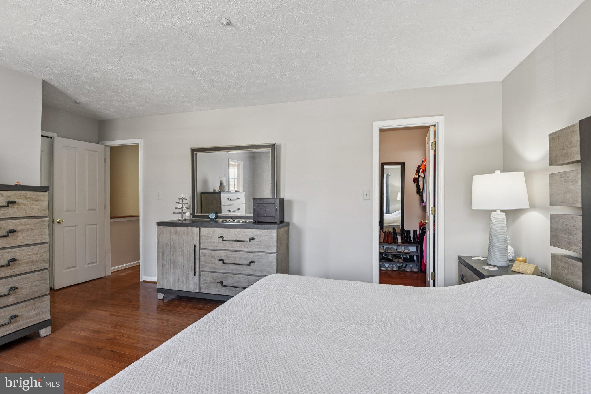 2612 Tallwind Court Crofton, MD 21054 - Photo 23 of 38 a bedroom with a bed and a dresser