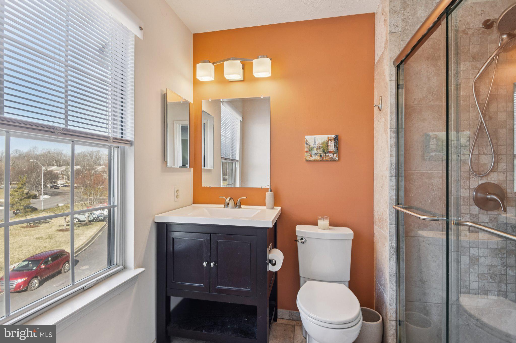 2612 Tallwind Court Crofton, MD 21054 - Photo 26 of 38 a bathroom with a toilet a sink and a shower