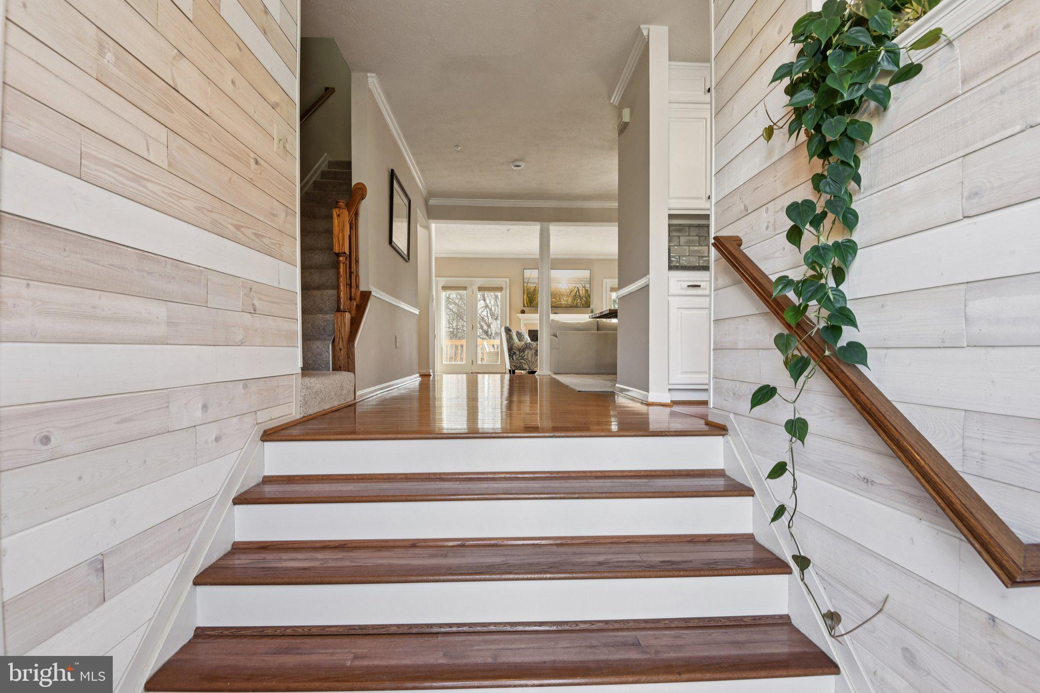 2612 Tallwind Court Crofton, MD 21054 - Photo 3 of 38 a view of staircase with white walls and a window