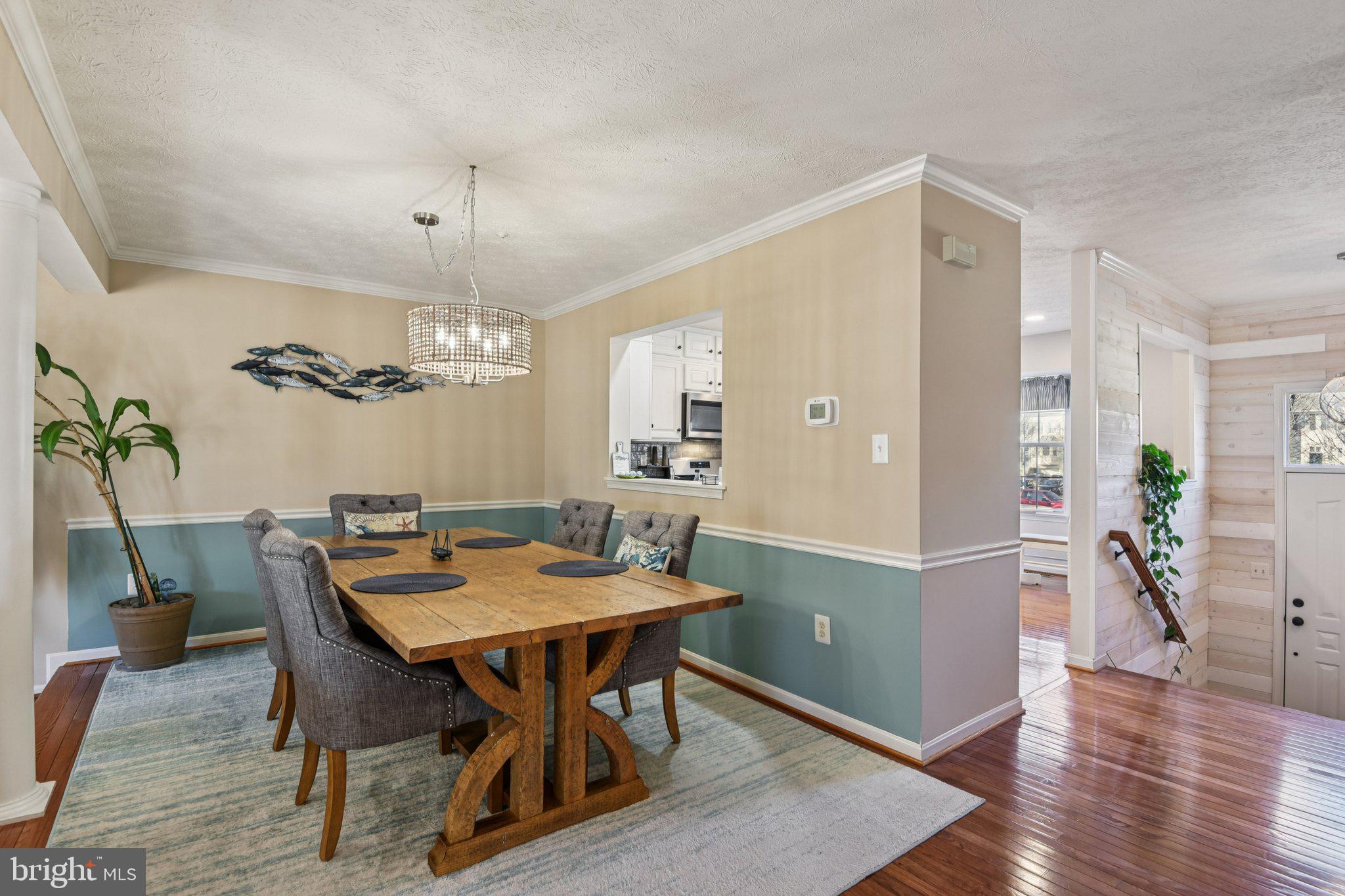 2612 Tallwind Court Crofton, MD 21054 - Photo 8 of 38 a view of a dining room with furniture window and wooden floor