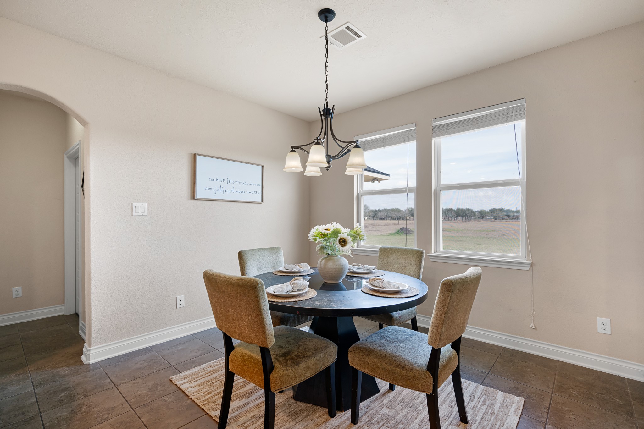 8131 Brinkmeyer Road Needville, TX 77461 - Photo 17 of 34 This dining area features a large windows with a view of the backyard.