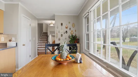 a bathroom with a sink a mirror and a shower