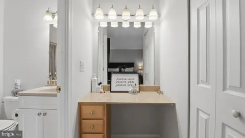 a view of room with window and cabinet