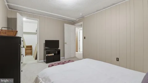 a utility room with sink dryer and washer