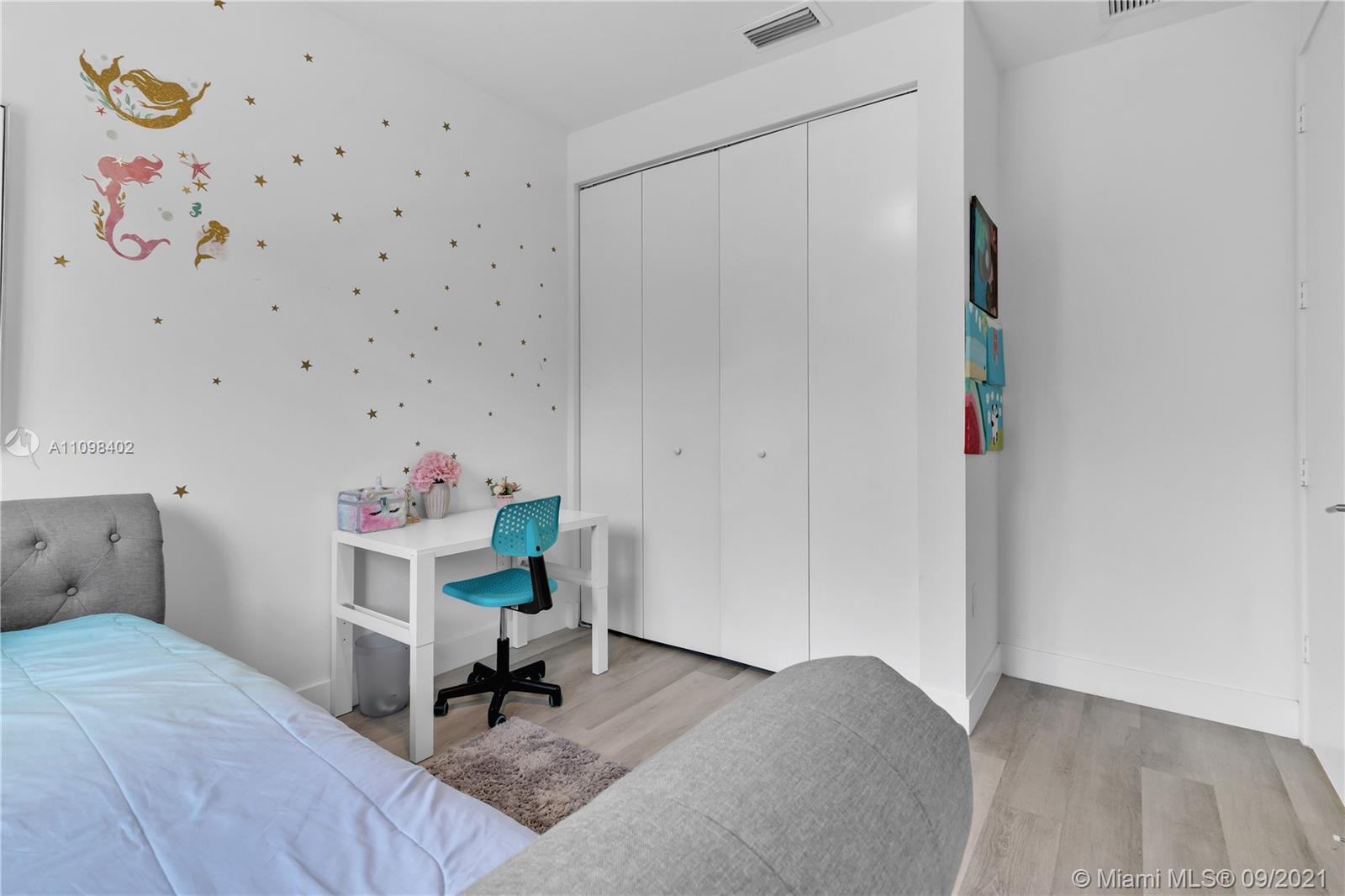 18334 Southwest 139th Path Miami, FL 33177 - Photo 22 of 62 a bedroom with a bed and a window