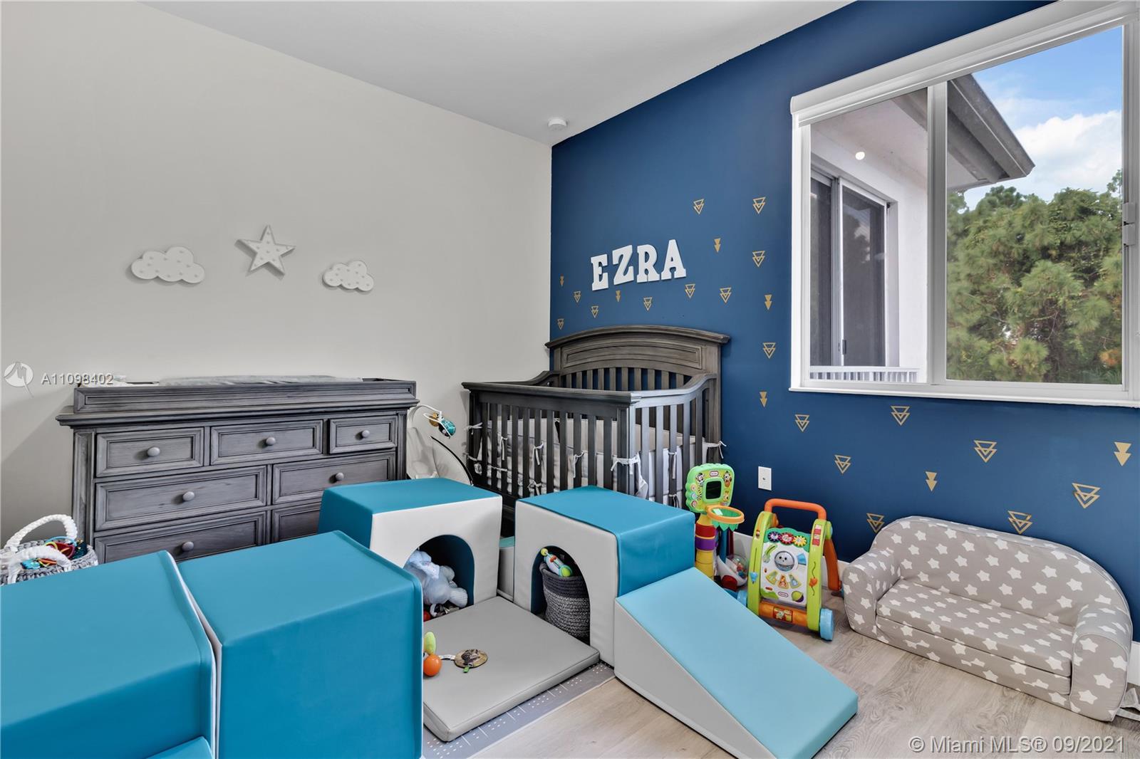 18334 Southwest 139th Path Miami, FL 33177 - Photo 23 of 62 a bedroom with furniture and a windows