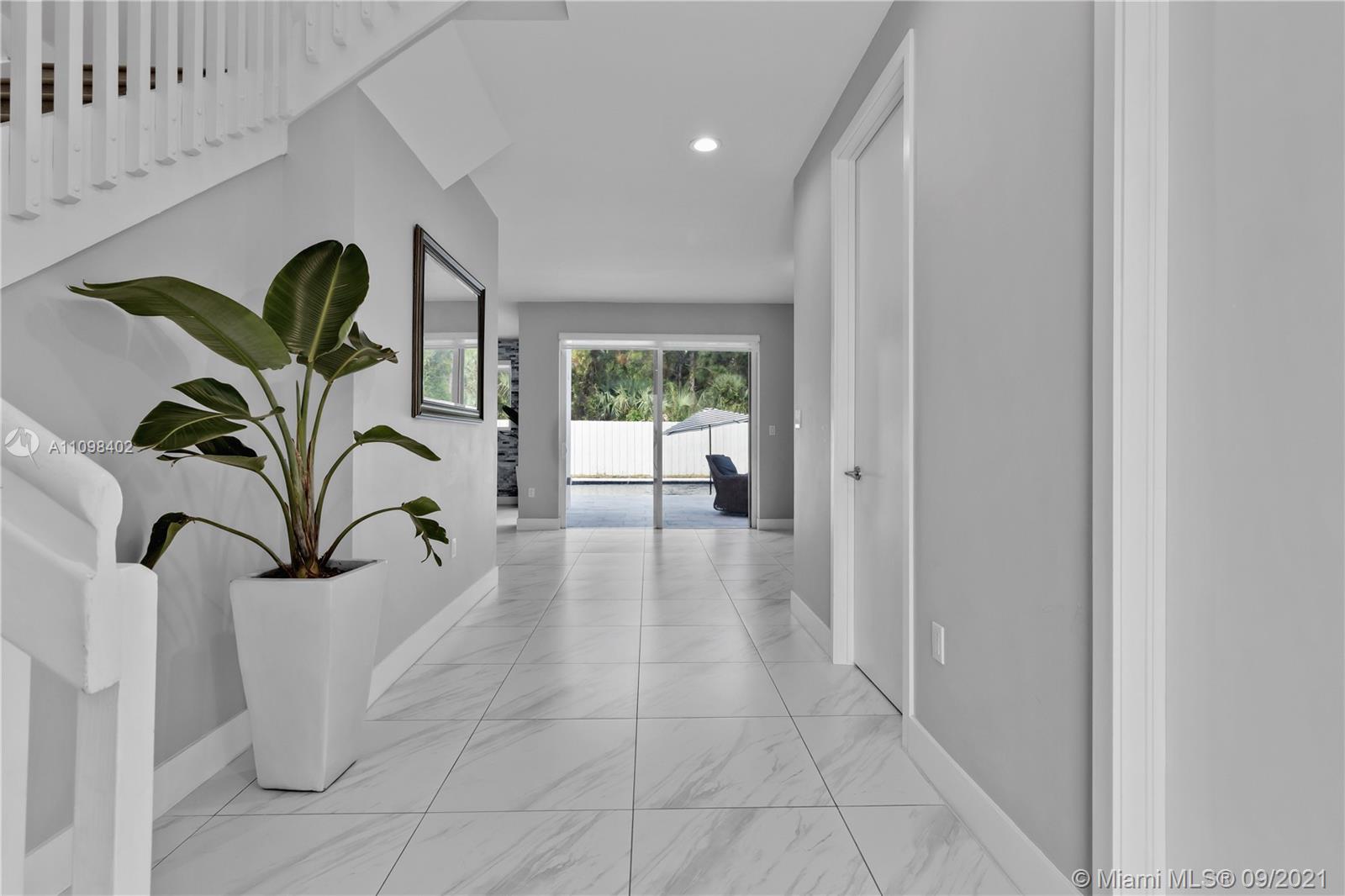 18334 Southwest 139th Path Miami, FL 33177 - Photo 37 of 62 a view of entryway with a potted plant