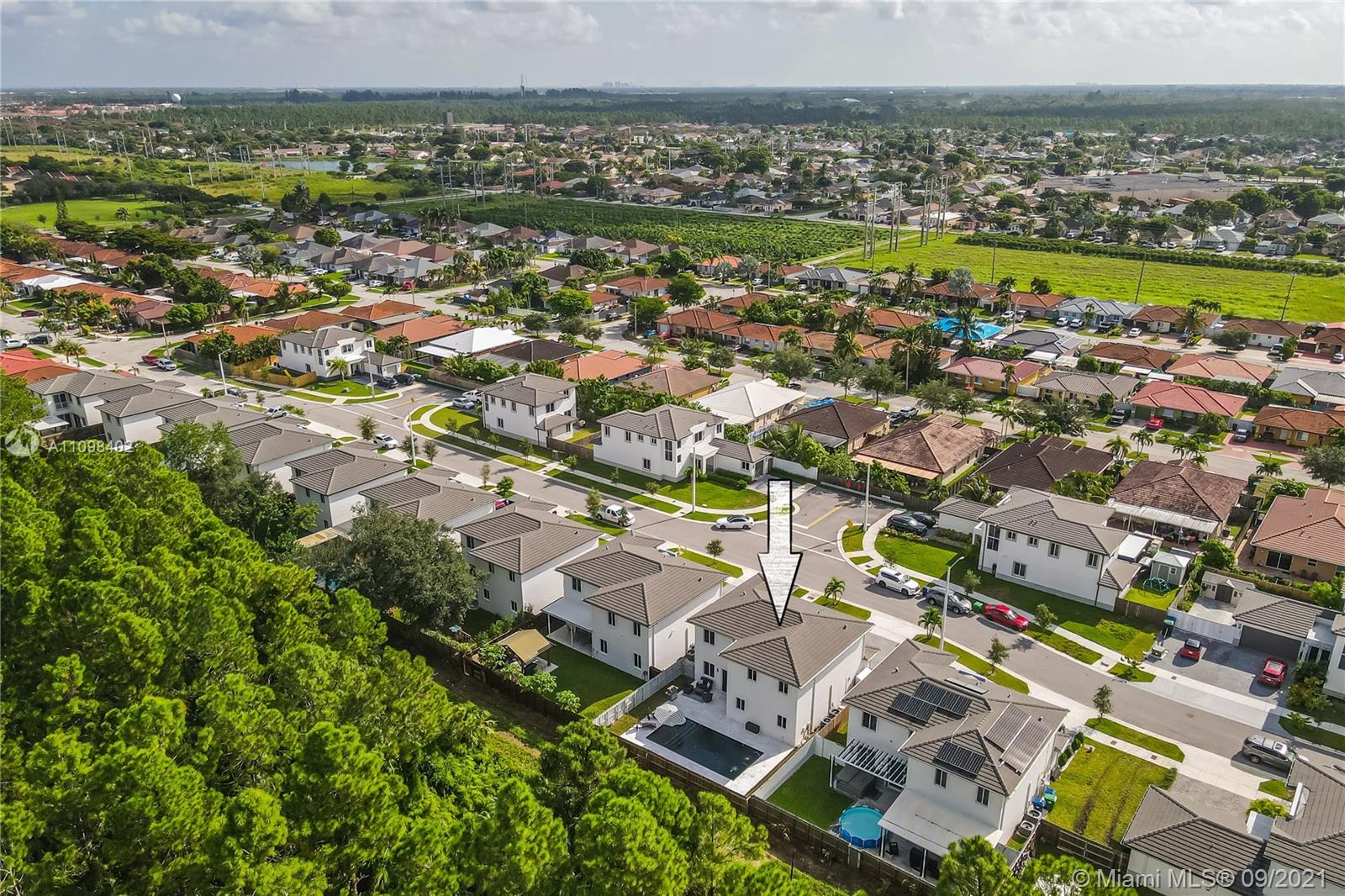 18334 Southwest 139th Path Miami, FL 33177 - Photo 52 of 62 an aerial view of residential building with outdoor space