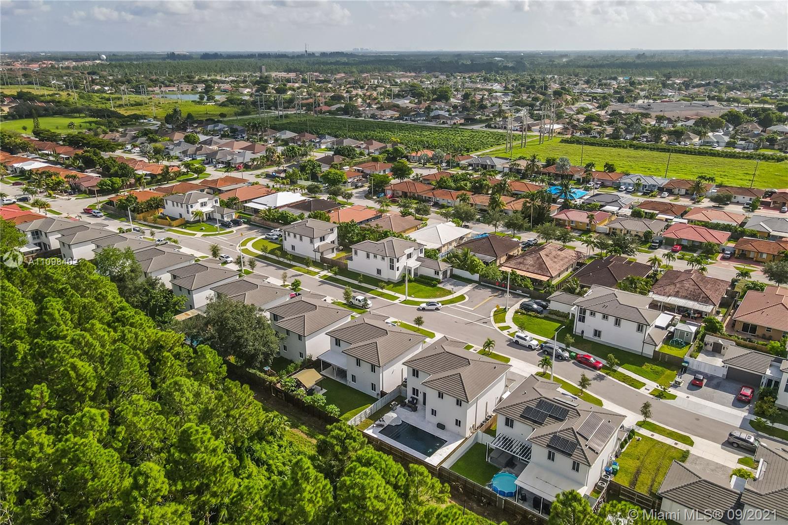 18334 Southwest 139th Path Miami, FL 33177 - Photo 53 of 62 an aerial view of residential building with outdoor space