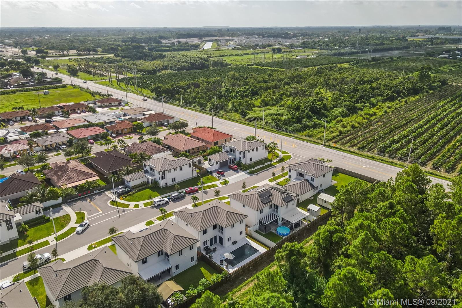 18334 Southwest 139th Path Miami, FL 33177 - Photo 55 of 62 a view of a city with a lake
