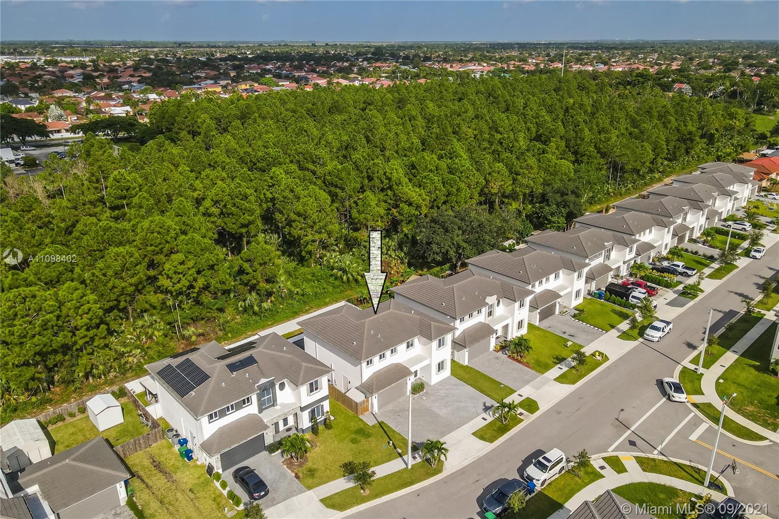 18334 Southwest 139th Path Miami, FL 33177 - Photo 60 of 62 an aerial view of residential houses with outdoor space