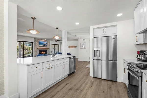 a view of a balcony with wooden floor