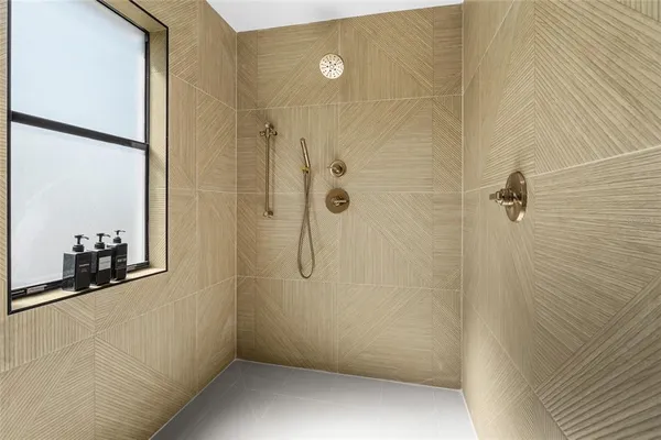 a bathroom with a toilet a sink and bathtub