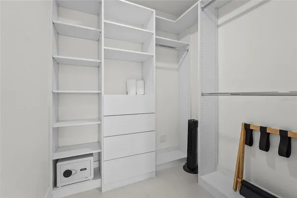 a view of a balcony with wooden floor