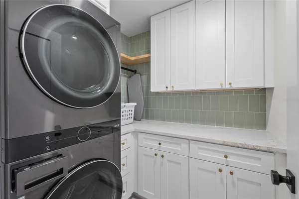 a view of room with a empty space and windows