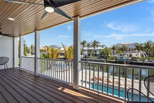 a picture of a room with a white wall and white refrigerator
