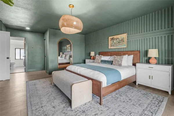 a kitchen with a stove cabinets and sink