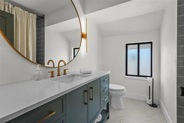 an aerial view of a house with a garden