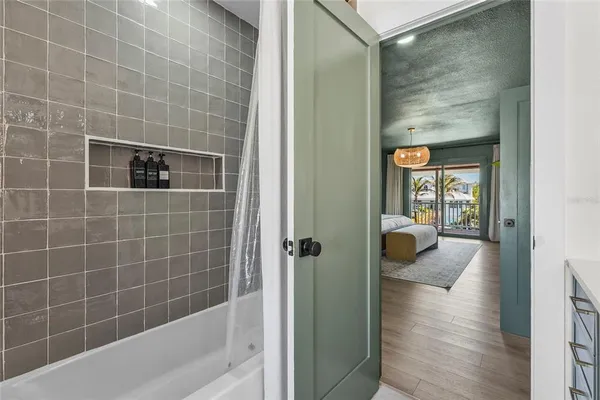 an aerial view of a house with lake view