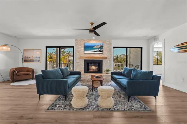 a kitchen with a refrigerator stove top oven and cabinets