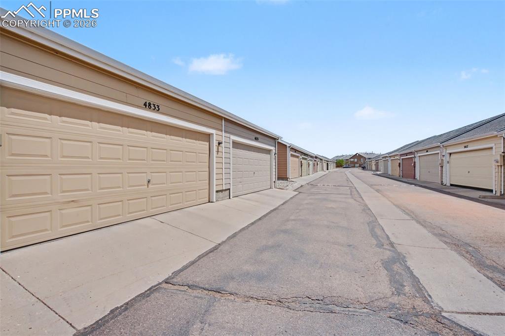 4833 Harrier Ridge Drive Colorado Springs, CO 80916 - Photo 25 of 25 a view of a back yard of the house