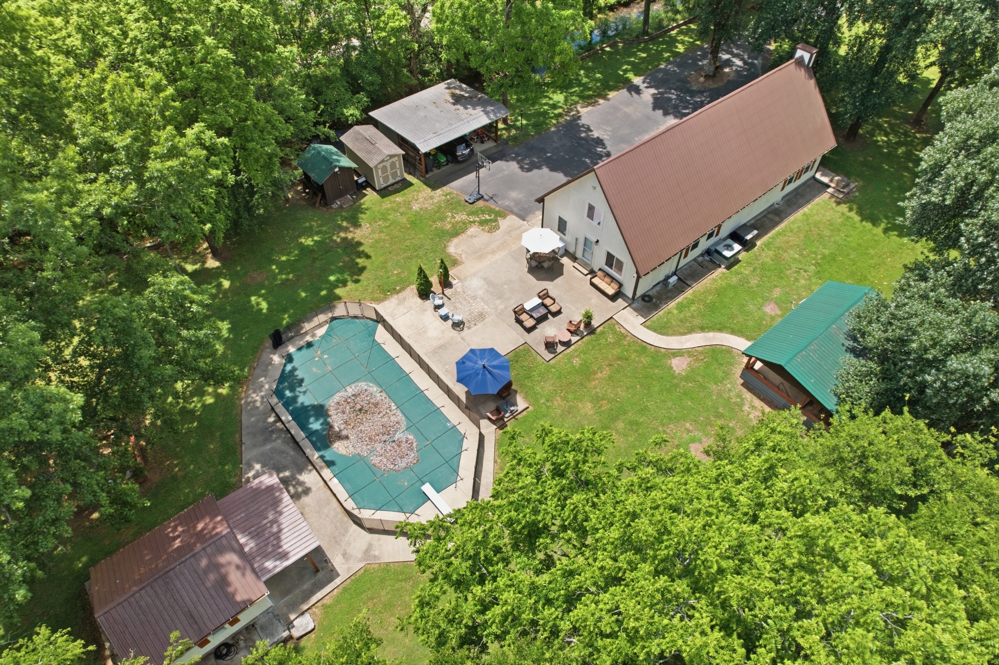2540 Carl Fox Road Cornersville, TN 37047 - Photo 4 of 48 an aerial view of a house with a yard and trees
