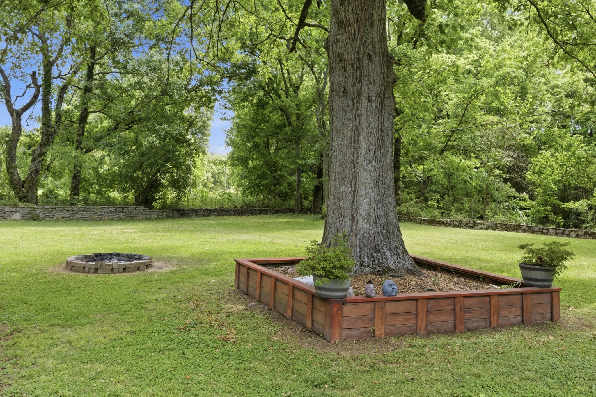 2540 Carl Fox Road Cornersville, TN 37047 - Photo 44 of 48 a view of a garden with wooden fence