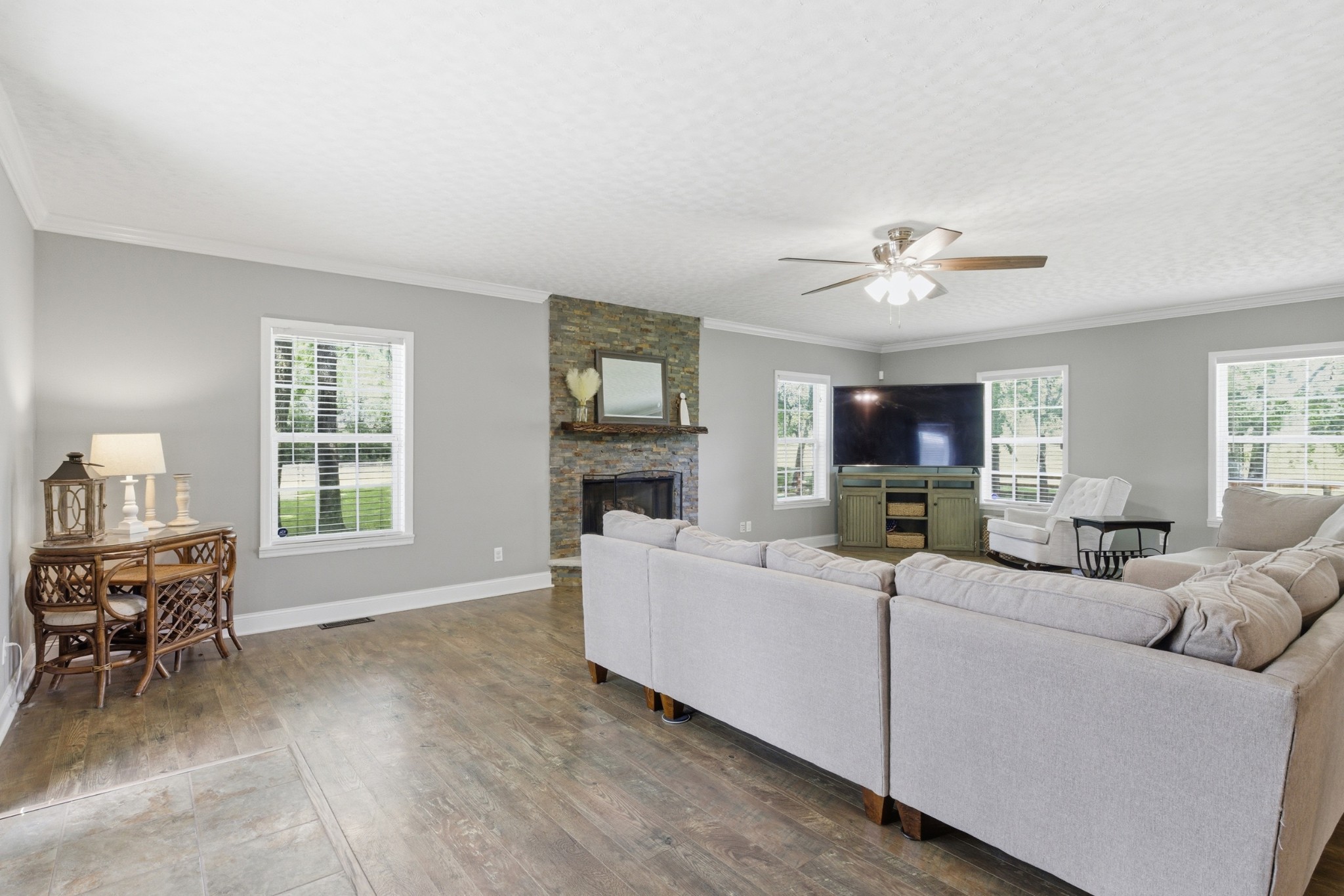 2540 Carl Fox Road Cornersville, TN 37047 - Photo 7 of 48 a living room with furniture a fireplace and a window