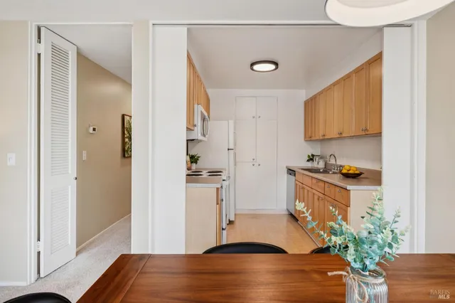 a room with wooden floor and entryway