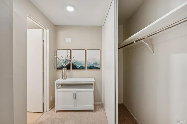 a room with a bench and a window