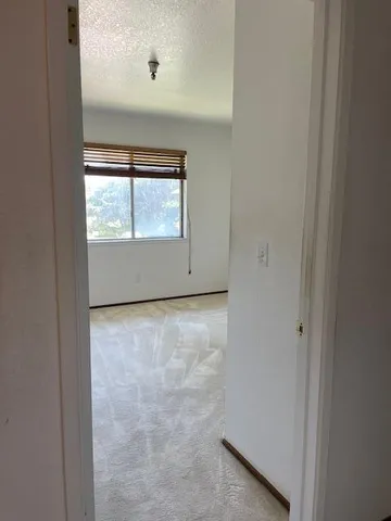 an empty room with window