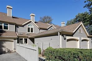 122 Boulder Ridge Road Scarsdale, NY 10583 - Photo 1 of 1 a front view of a house with a yard