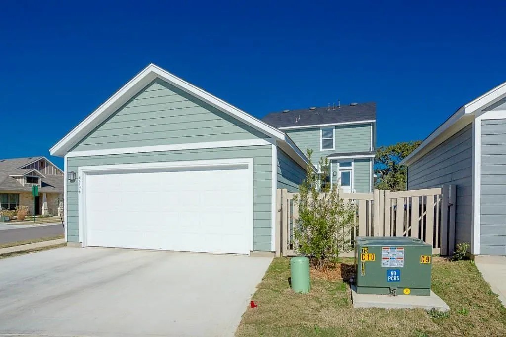 5136 Hellman Kyle, TX 78640 - Photo 2 of 17 View of front of home featuring a garage