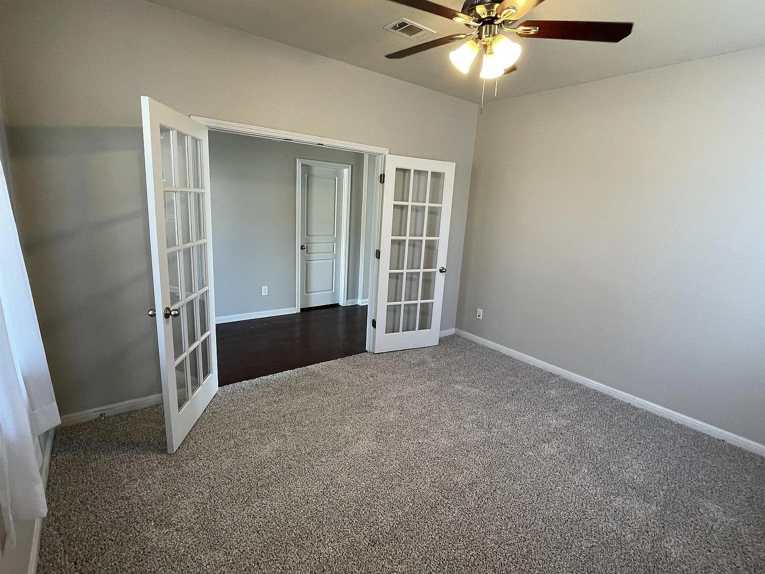 5136 Hellman Kyle, TX 78640 - Photo 6 of 17 Carpeted empty room featuring french doors and a ceiling fan
