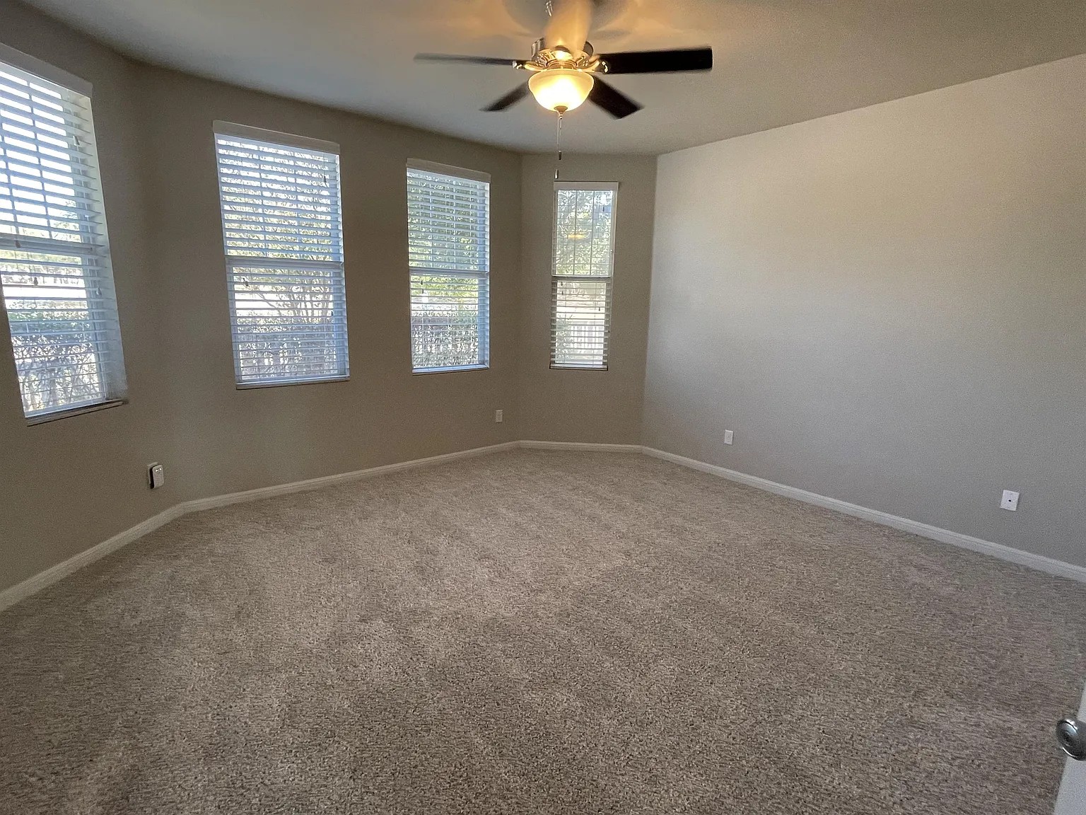 5136 Hellman Kyle, TX 78640 - Photo 9 of 17 Carpeted empty room featuring baseboards and a ceiling fan
