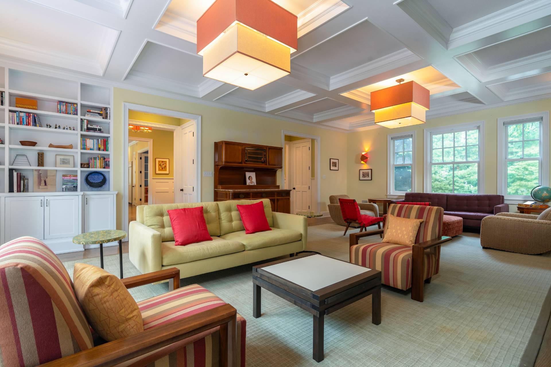 12 Old Point Road Quogue, NY 11959 - Photo 12 of 50 a living room with furniture a flat screen tv and a large window