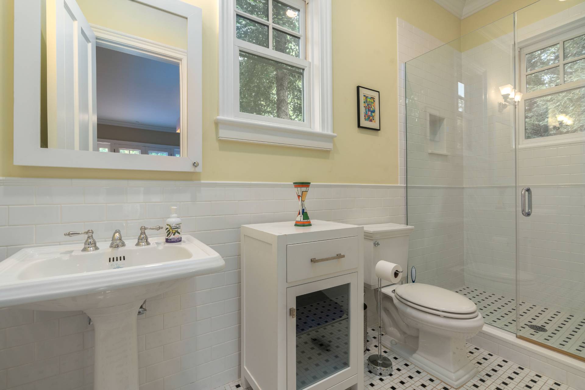 12 Old Point Road Quogue, NY 11959 - Photo 15 of 50 a bathroom with a sink a toilet and a mirror