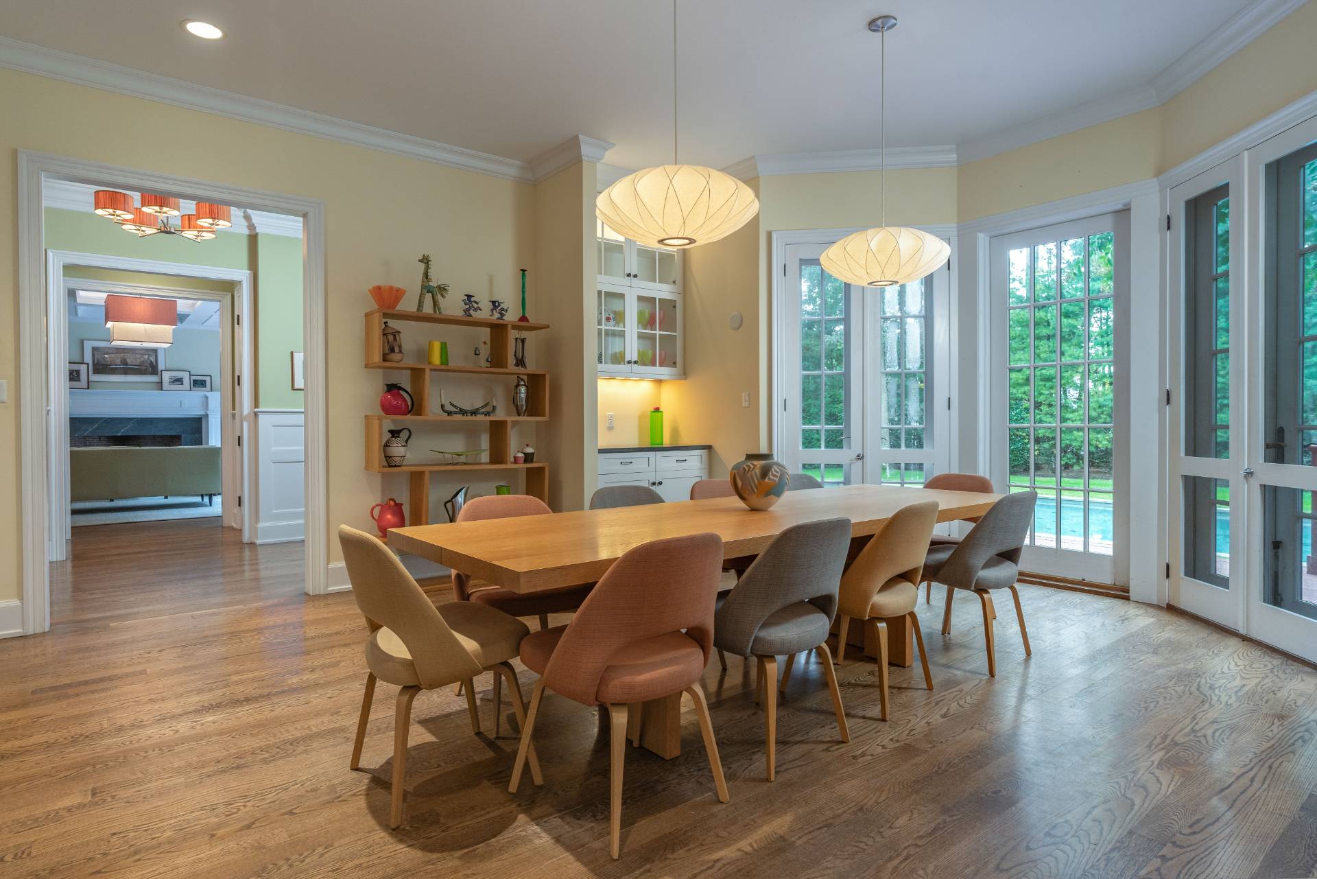 12 Old Point Road Quogue, NY 11959 - Photo 16 of 50 a view of a dining room with furniture window and wooden floor