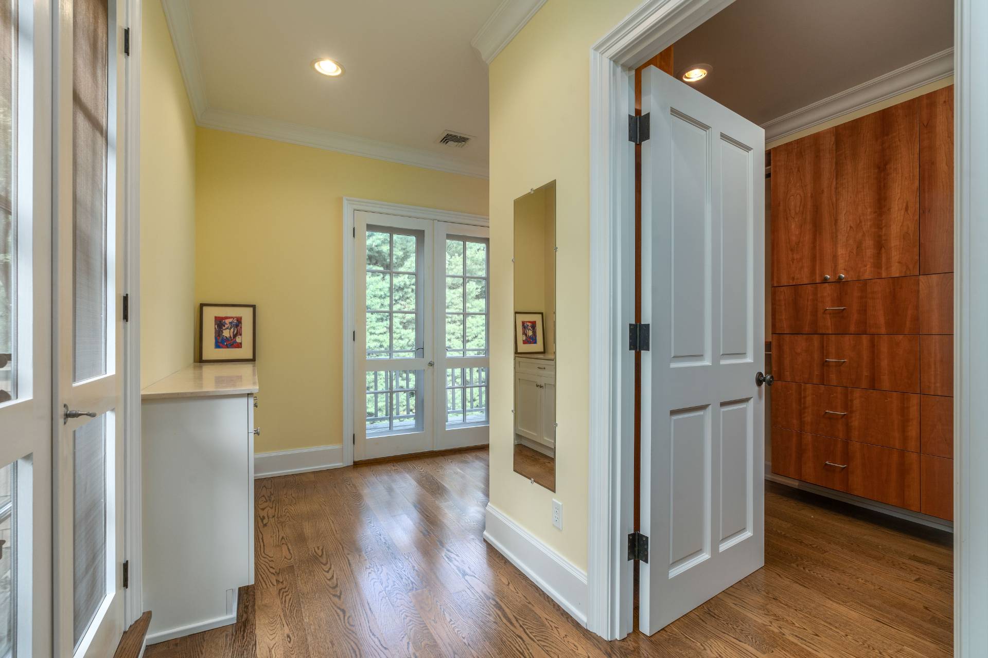 12 Old Point Road Quogue, NY 11959 - Photo 28 of 50 a view of an entryway with wooden floor and door