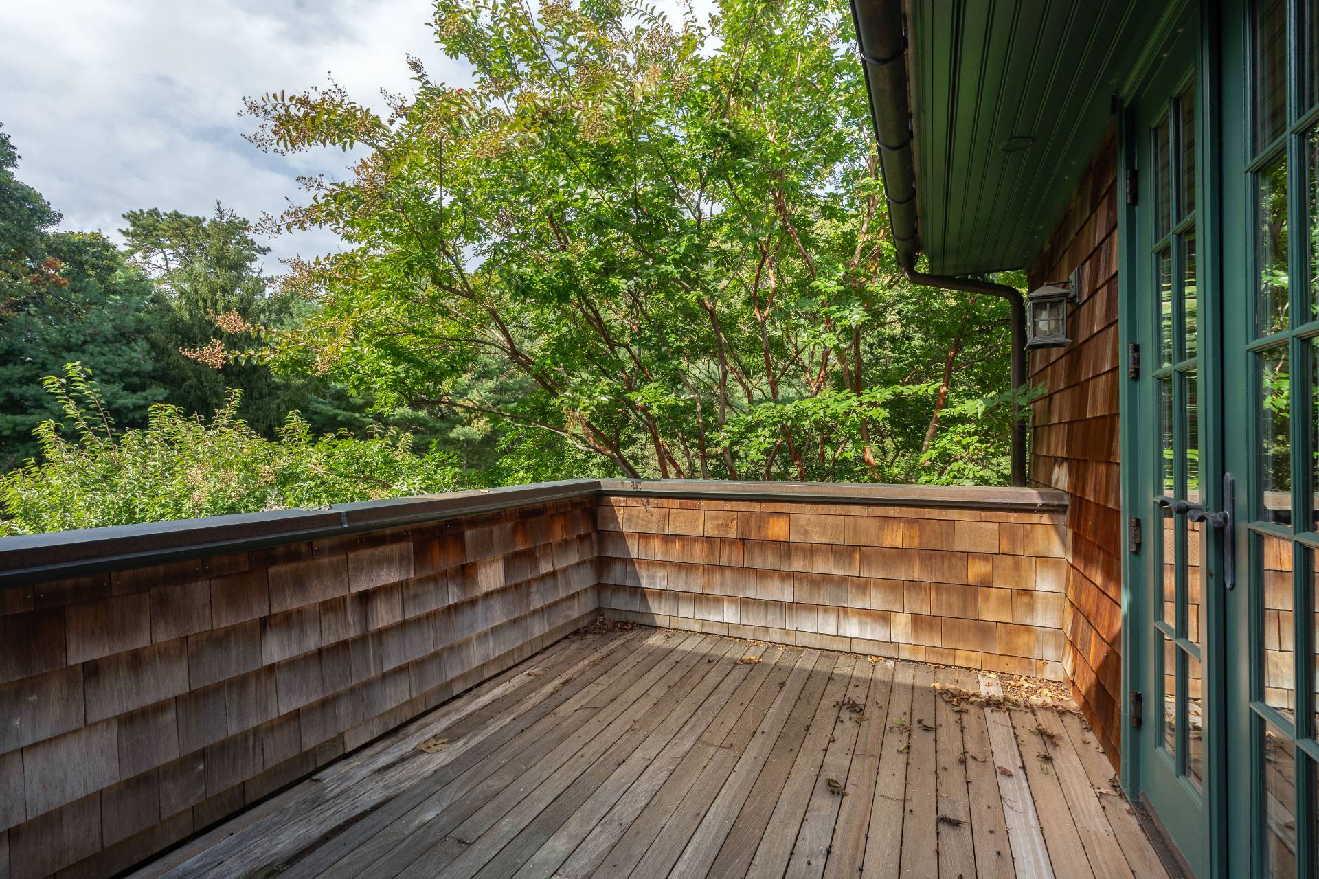 12 Old Point Road Quogue, NY 11959 - Photo 29 of 50 a view of balcony with wooden floor