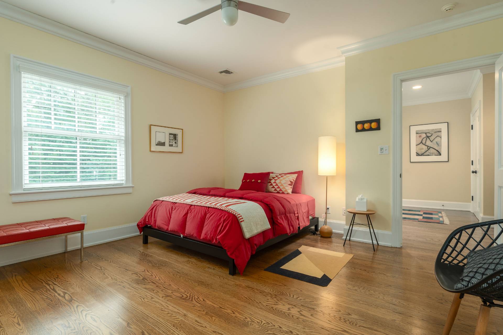 12 Old Point Road Quogue, NY 11959 - Photo 34 of 50 a spacious bedroom with a bed and wooden floor